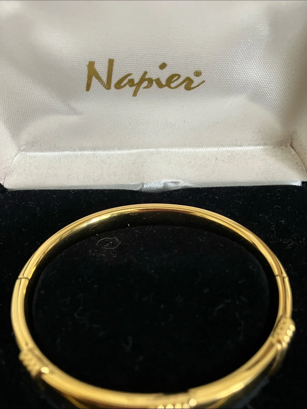Napier Gold Tone Ribbed Accent Hinged Bangle Bracelet - Picture 2 of 5